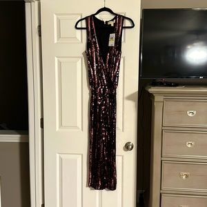 Black and pink beaded jumpsuit. Michael Kora